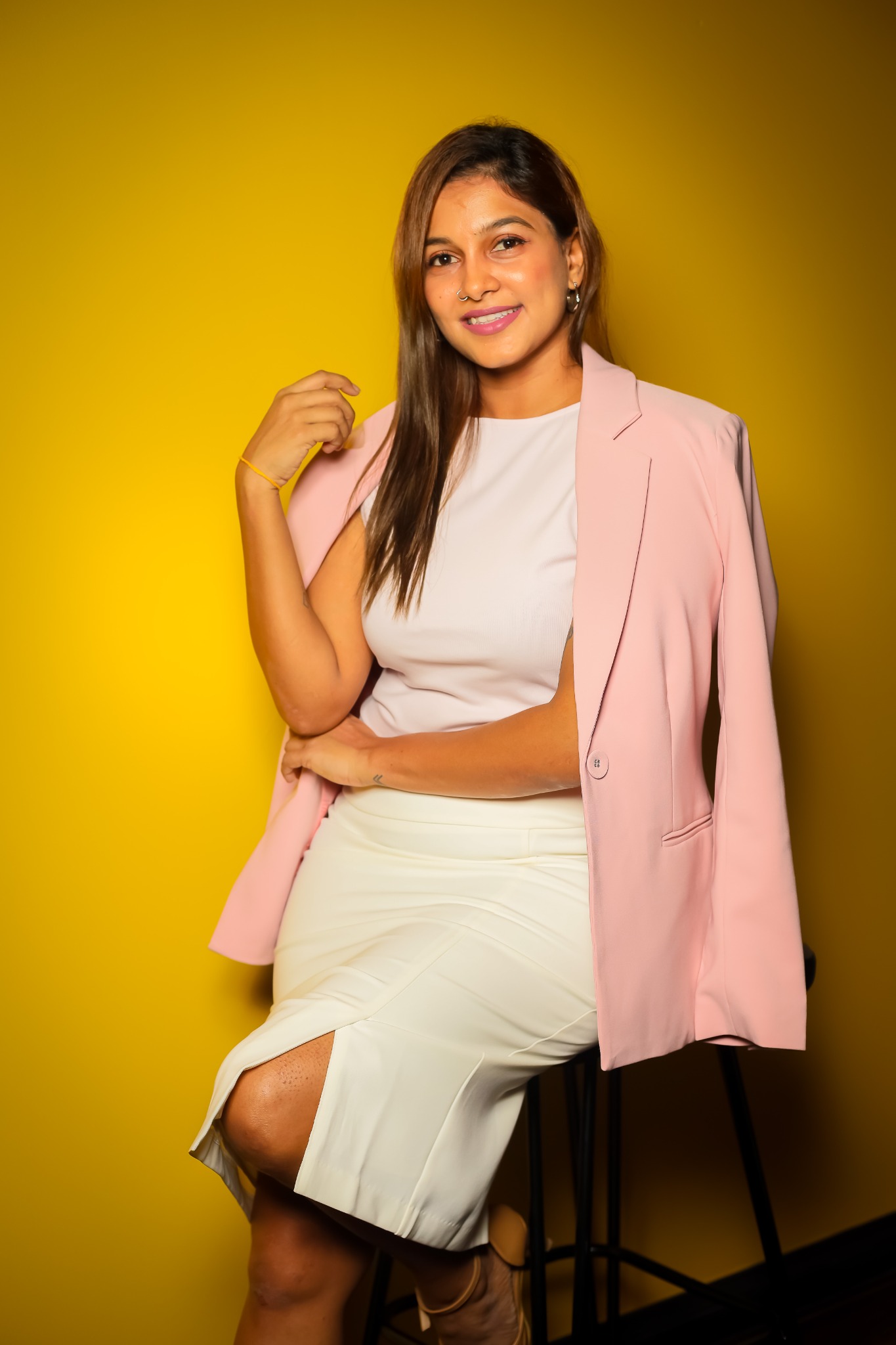 Anubama Ramachandra smiling, wearing a pink blazer